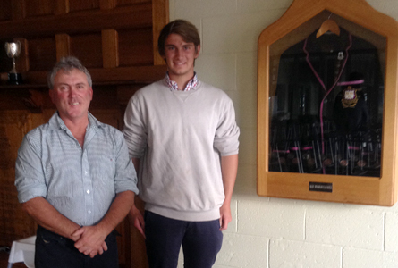 Charles Burbury and his uncle Iain Burbury ('81) with his father's Alec Burbury Award.