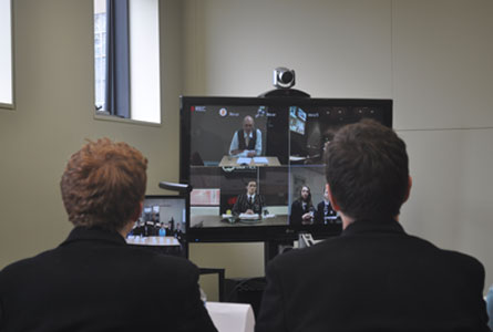 Hutchins students talk face to face with The Hon. Peter Garrett via a live video link in the Nettlefold Library's Global Classroom.