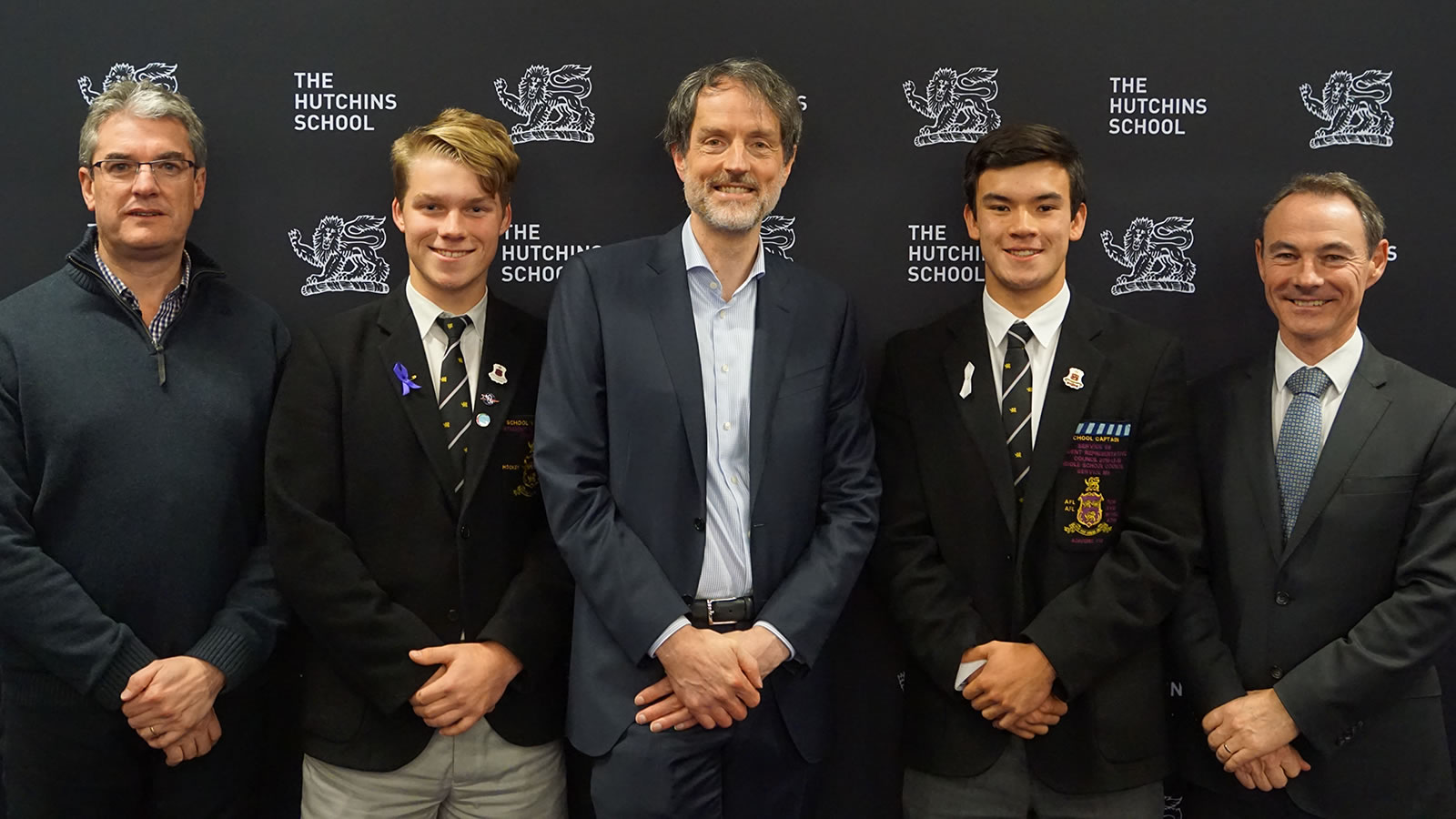 L–R Mr Gene Phair (Chairperson of the Board), Alex Hogan-Jones (School Vice-Captain), Professor Rufus Black, Oliver Burrows-Cheng (School Captain), Dr Rob McEwan (Headmaster).