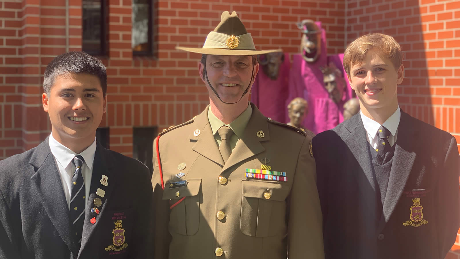 Rhys Evans (Year 12), Lieutenant Colonel Paul O’Donnell, and Oliver Elrick (Year 10)