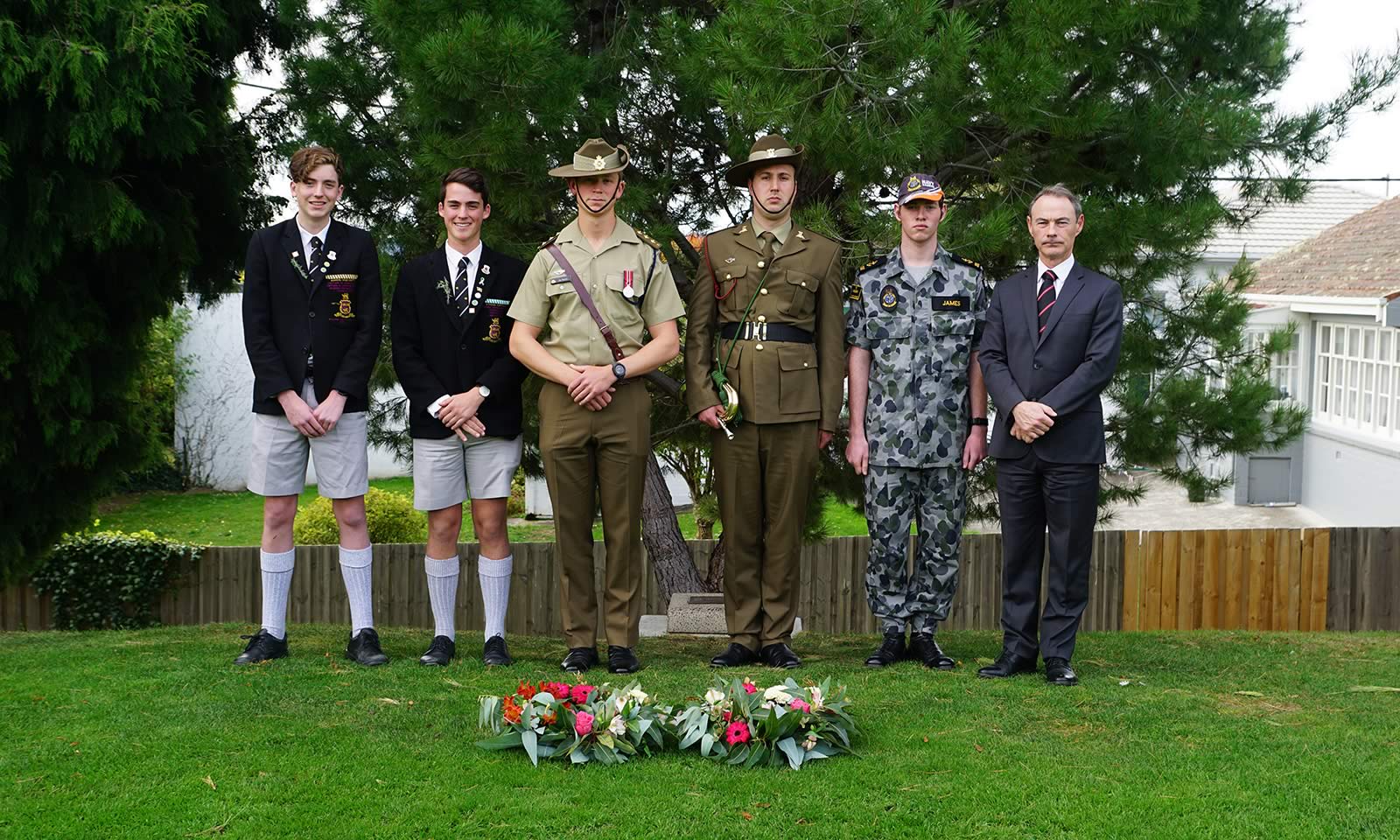 Ben Horsham (School Vice-Captain), Harry Jones (School Captain), Captain Zachary Hucker, Alec Beattie, Seth James (Year 11) and Headmaster, Dr Rob McEwan