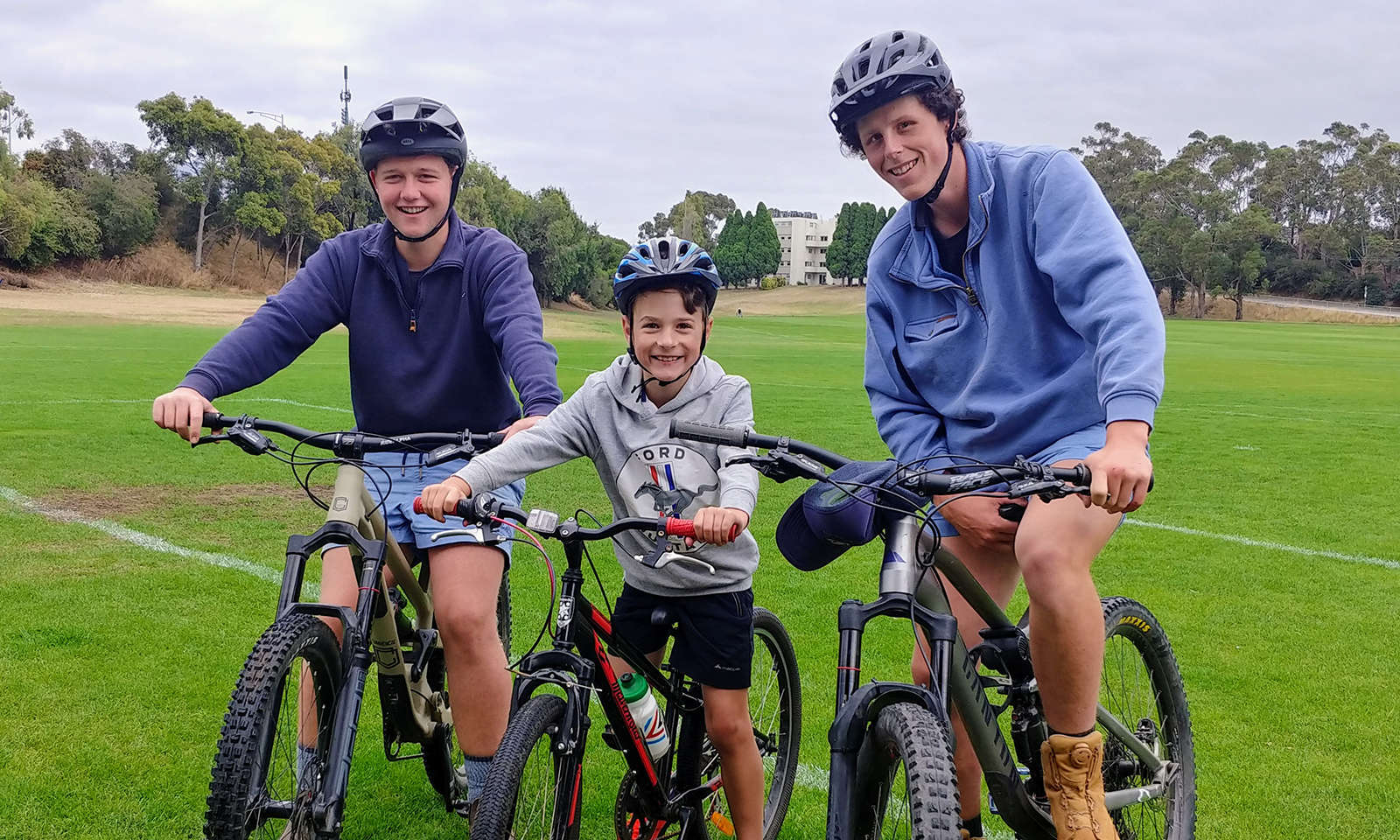 The Hutchins School Parents’ Association Blokes and Spokes bike ride with Year 11 student, Sam Fisher, Year 3 student, Hamish Moase and Year 12 student, Sam McShane about to ride together.