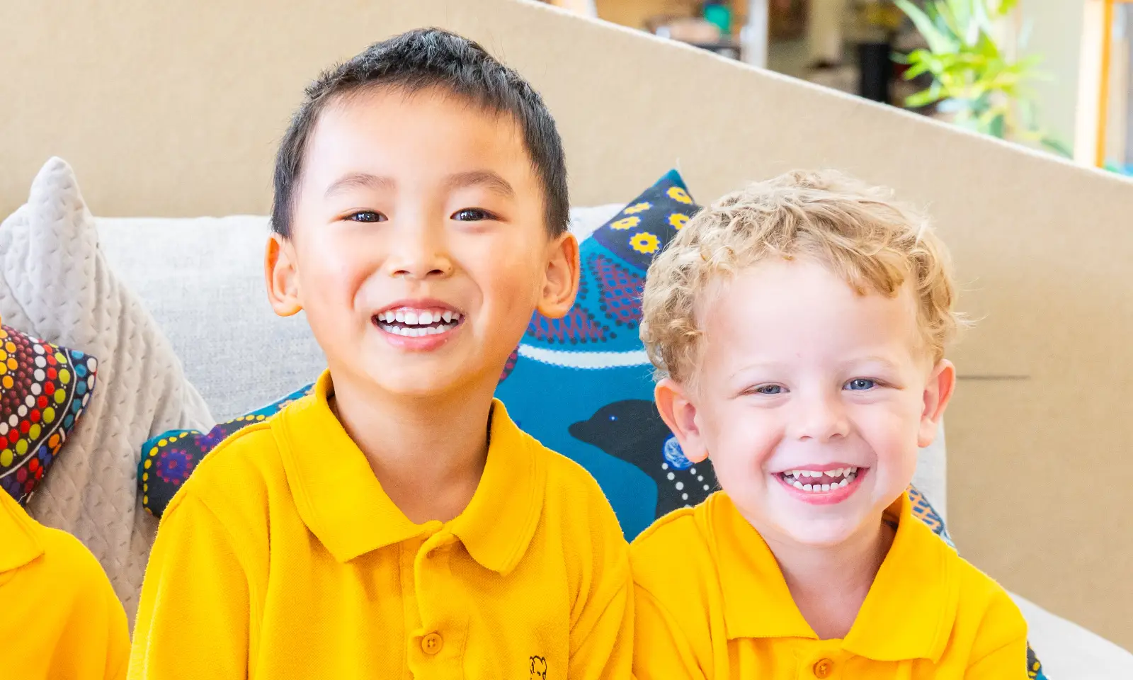 Two smiling Early Years students.