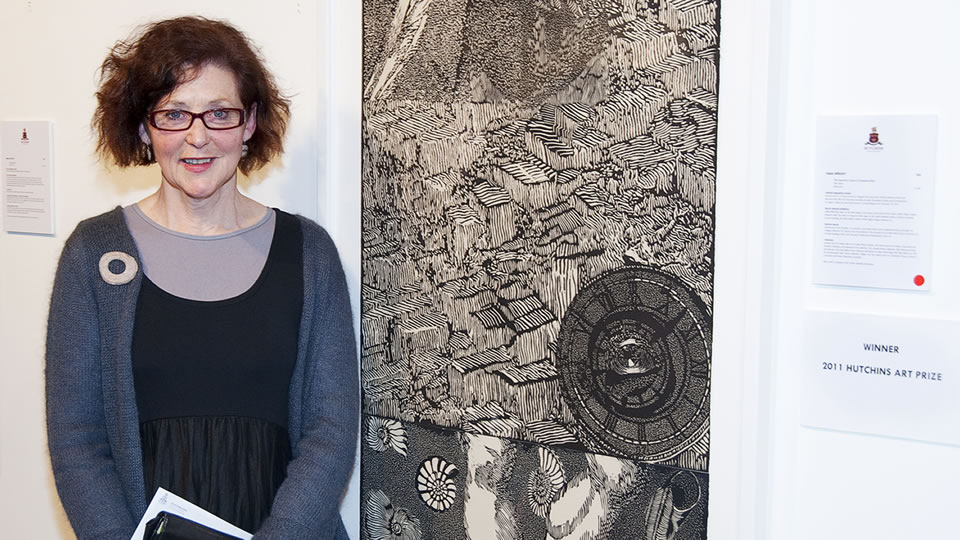 The 2011 winner of The Hutchins Art Prize, Helen Wright with her relief print, The Exquisite Corpse of Seaweed Man.