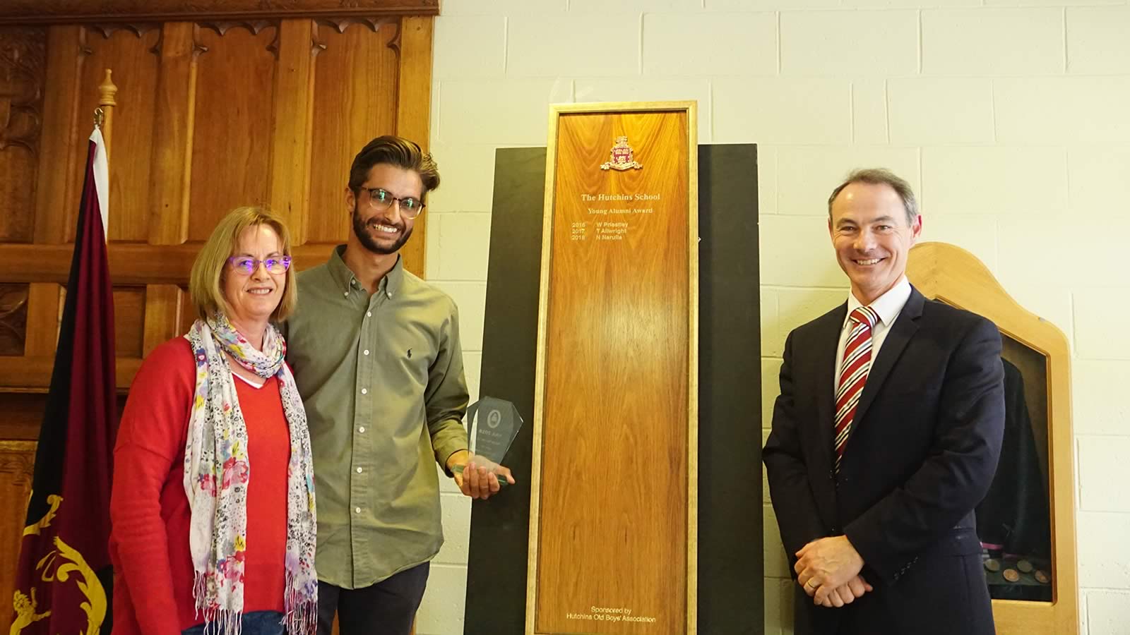 Nanak Narulla (’11) receiving the HSOBA Young Alumni Award with mother Sally Brown and Dr Rob McEwan.