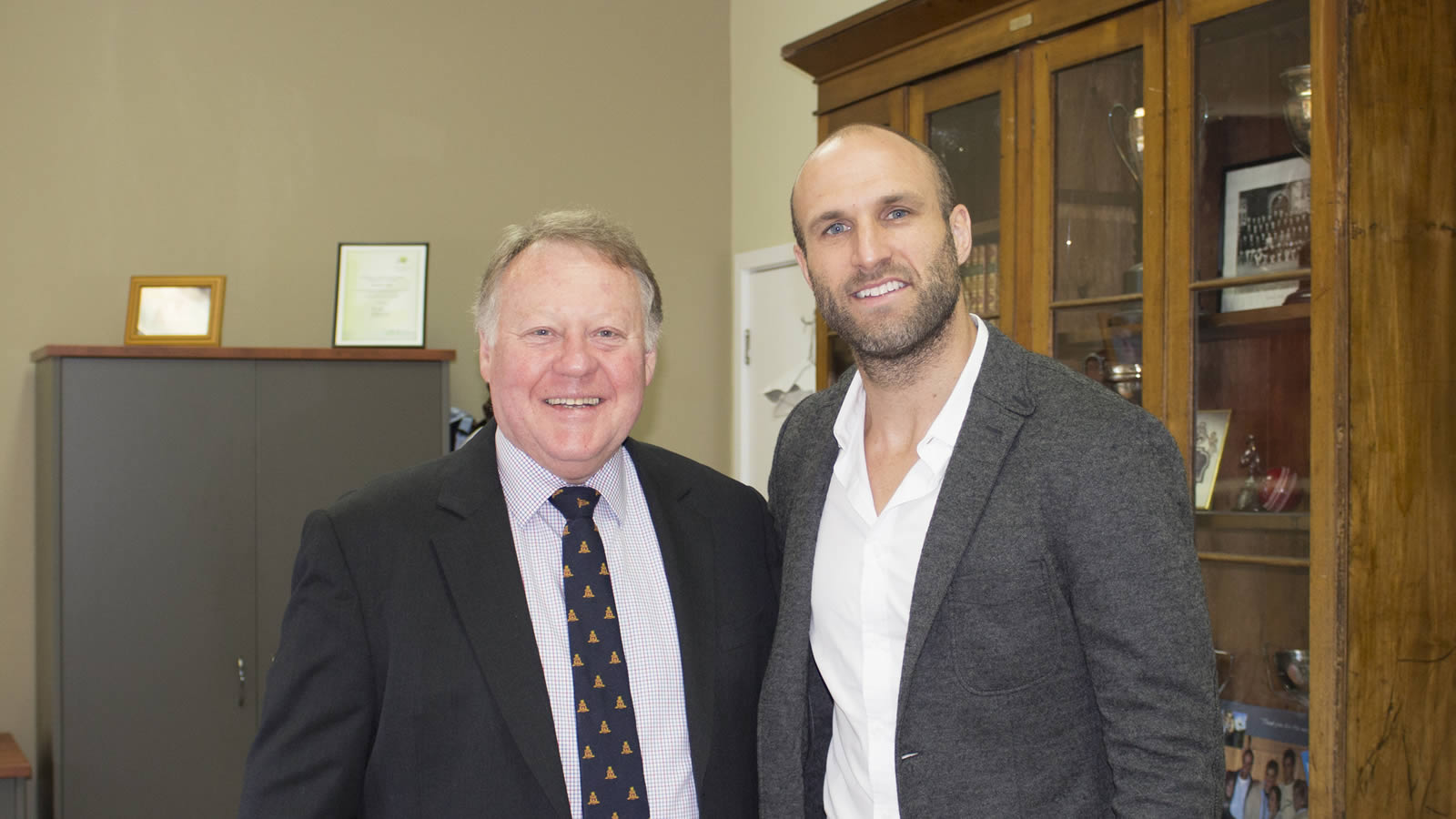 Mr Warwick Dean, Headmaster, with dual Brownlow medallist, Chris Judd (large)