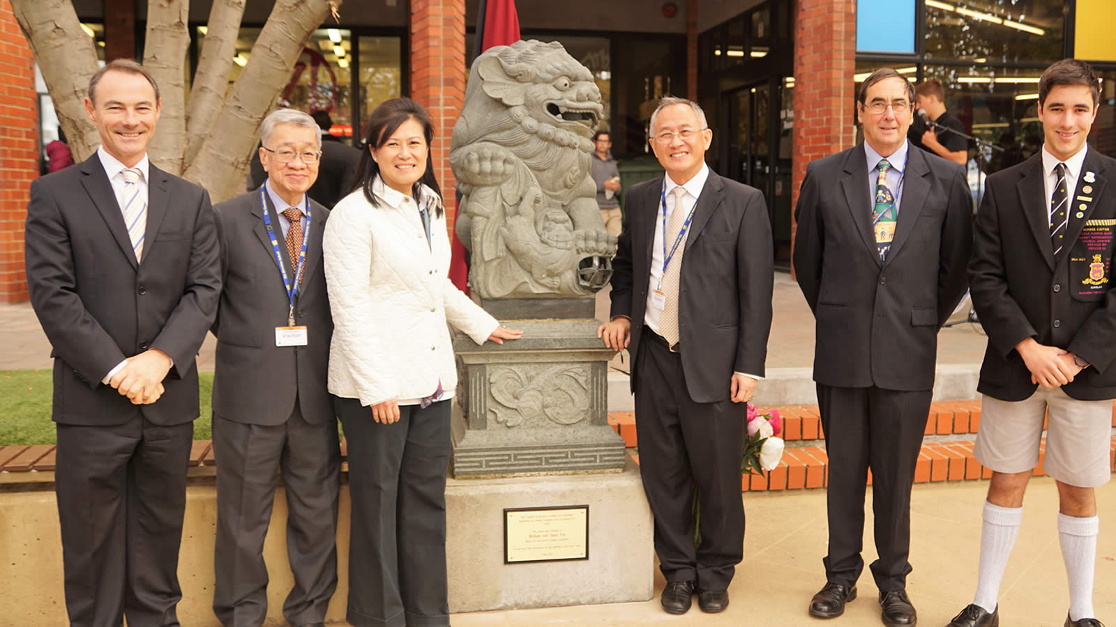 Dr Rob McEwan (Headmaster), Mr Tan, Daisy Yiu, William Yiu, Mr Bill Toppin (Headmster 1997–2007) and Thomas Dunbabin (School Captain).