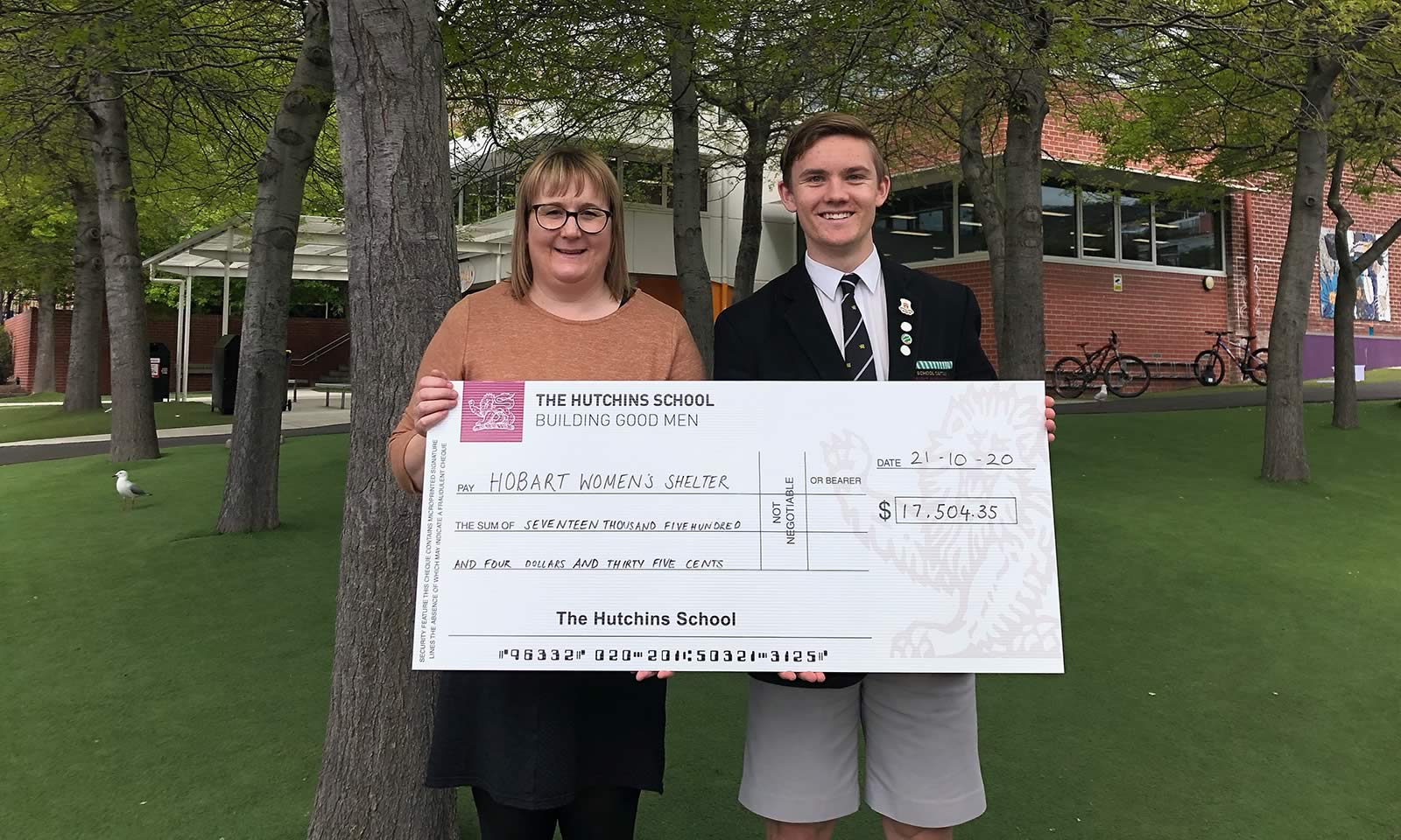 Ewan Sloan (School Captain) and Janet Saunders (CEO of the Hobart Women’s Shelter)