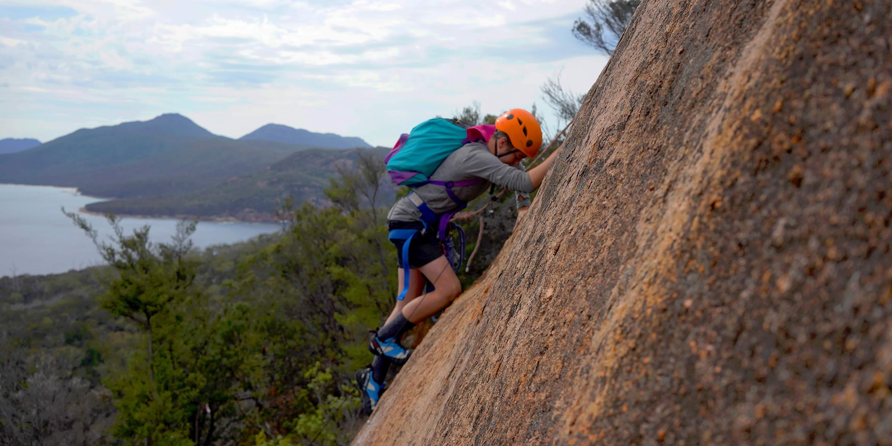 Student rock climbing